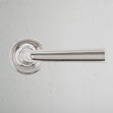 Clayton Fixed Door Handle Polished Nickel Finish on White Background Front Facing