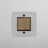 Stylish Single Rocker Switch with 2 Positions in Clear Antique Brass Black on White Background