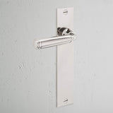 Digby Long Plate Fixed Door Handle Polished Nickel Finish on White Background at an Angle