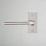 Apsley Short Plate Fixed Door Handle Polished Nickel Finish on White Background right Facing Front View