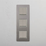 Vertical Six-Unit Rocker Switch in Polished Nickel White on White Background