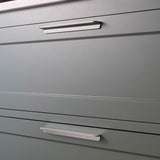Polished Nickel Oxford Furniture Handle 384mm fitted to green under cabinet drawers. 