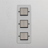 Advanced Vertical Six-Position Triple Rocker Switch in Clear Polished Nickel Black - Multifunctional Light Management Tool on White Background