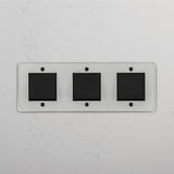 Comprehensive Triple Rocker Switch in Clear Bronze Black for Light Management on White Background